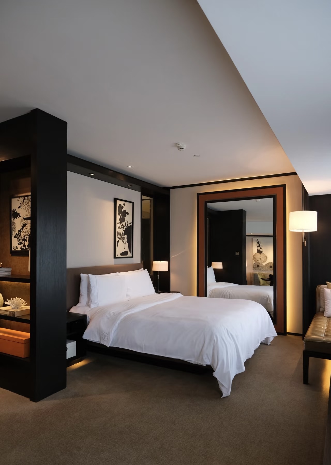 Serviced apartment bedroom linen setup